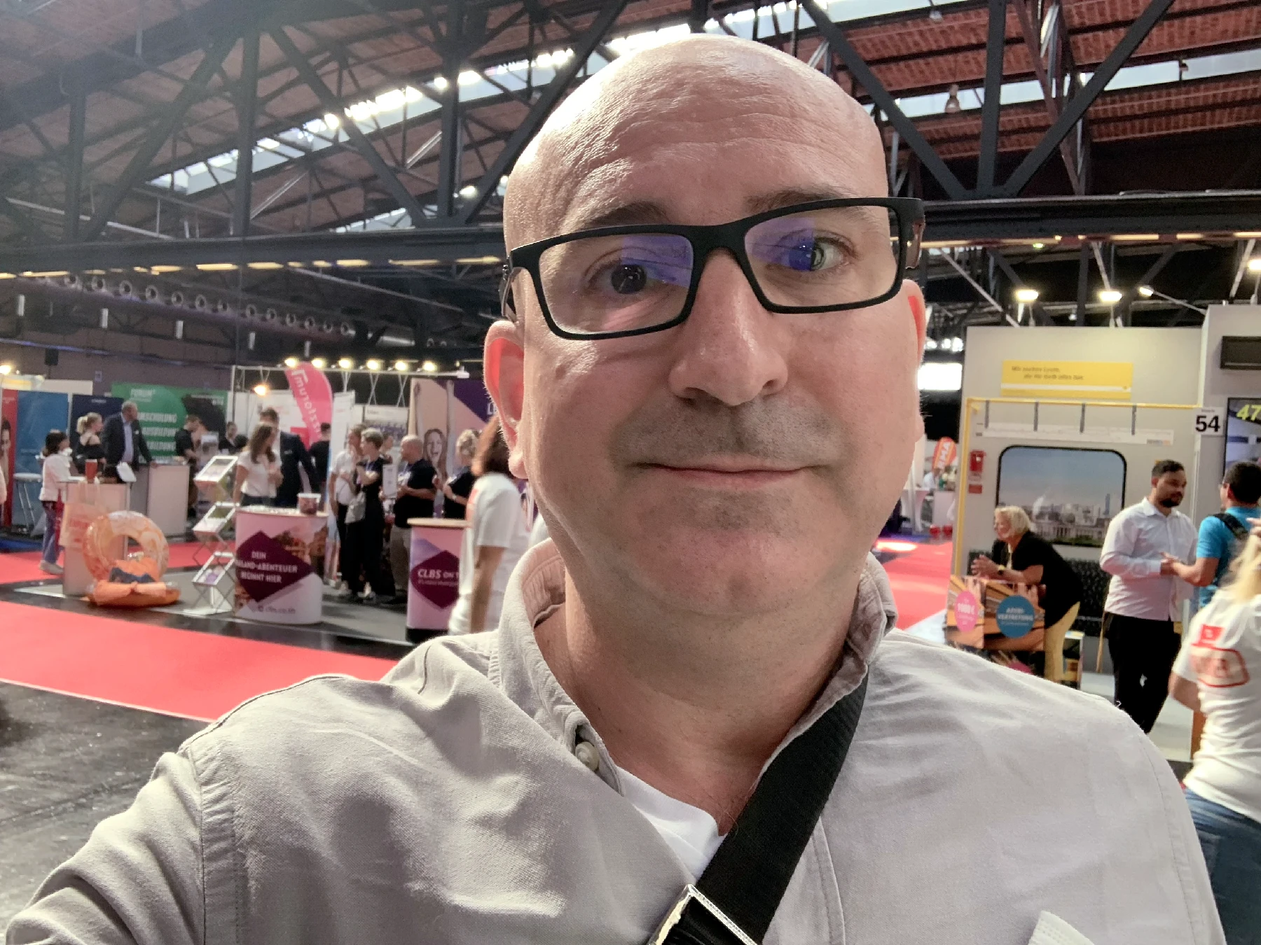 Marin standing in the main hall of the job fair in Berlin