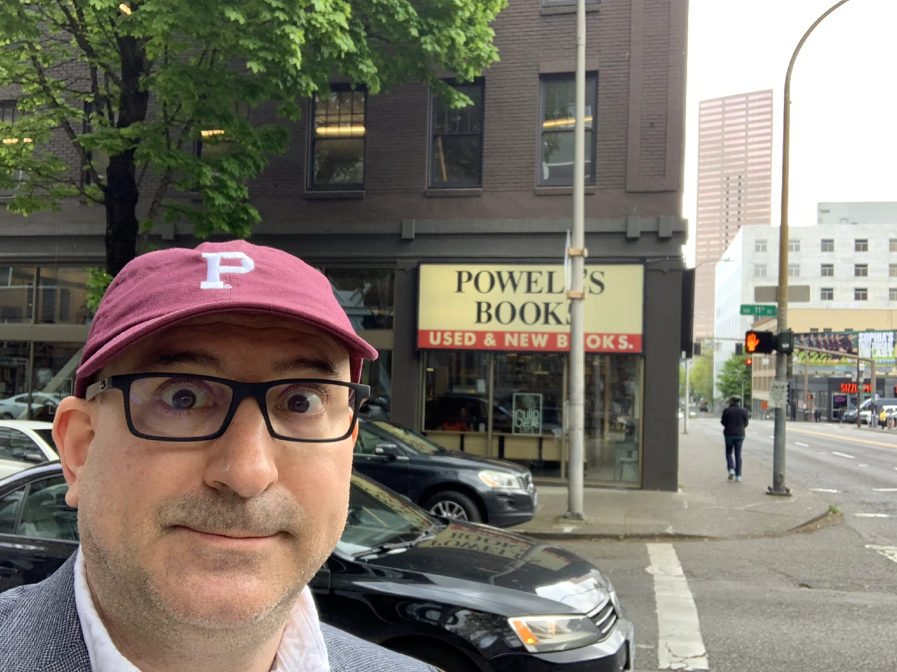 Marin standing in front of Powell's City of Books in Portland