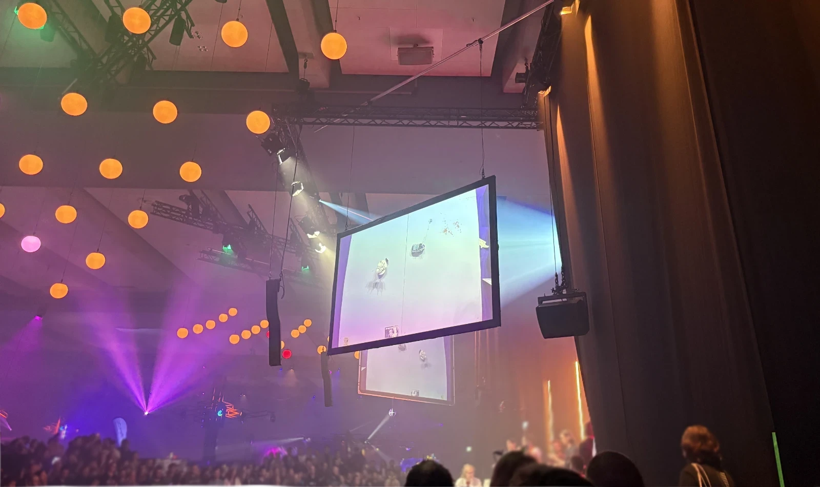 A large screen showing two shitty robots about to collide