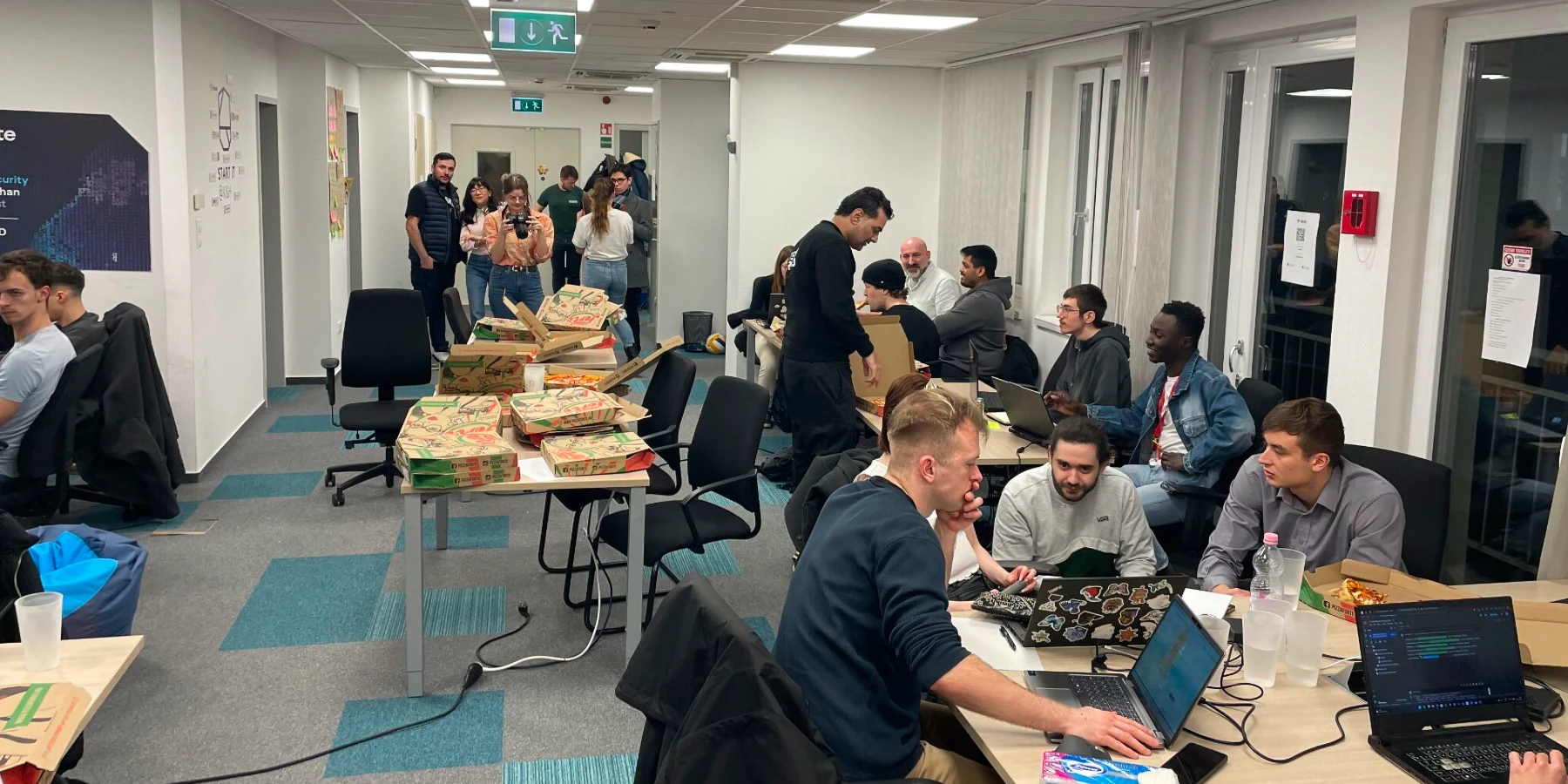 A group of participants working in one of the rooms