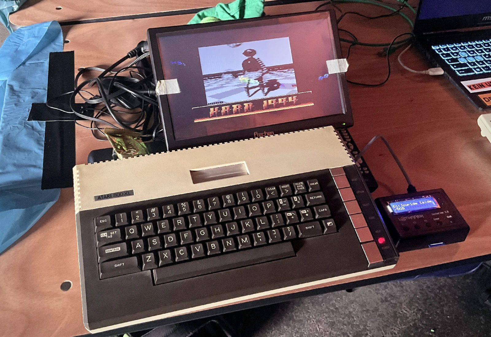 An Atari 800XL connected to a modern LCD monitor and SD-card storage.