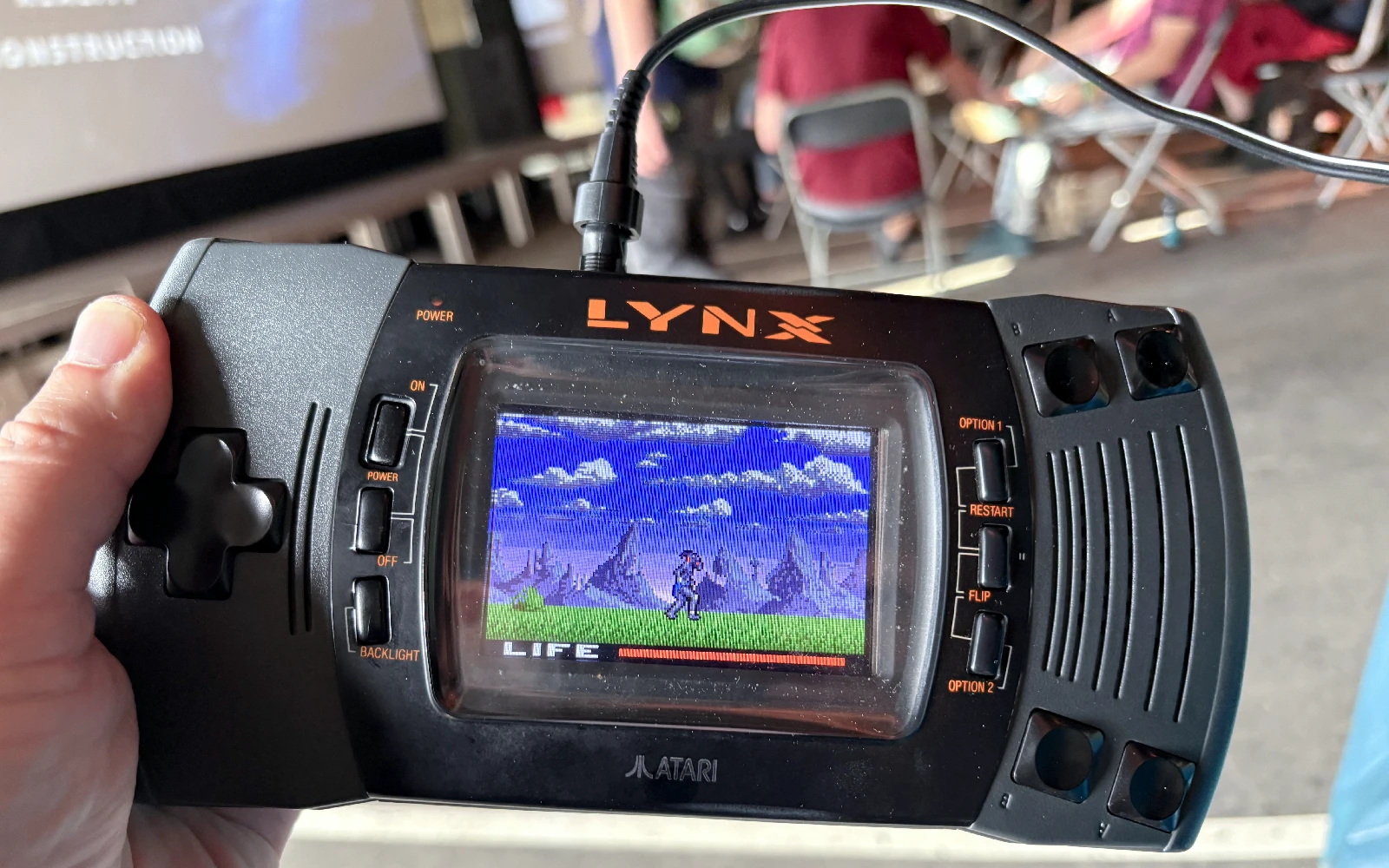 Zeki's modified Atari Lynx with a modern screen running Shadow of the Beast.