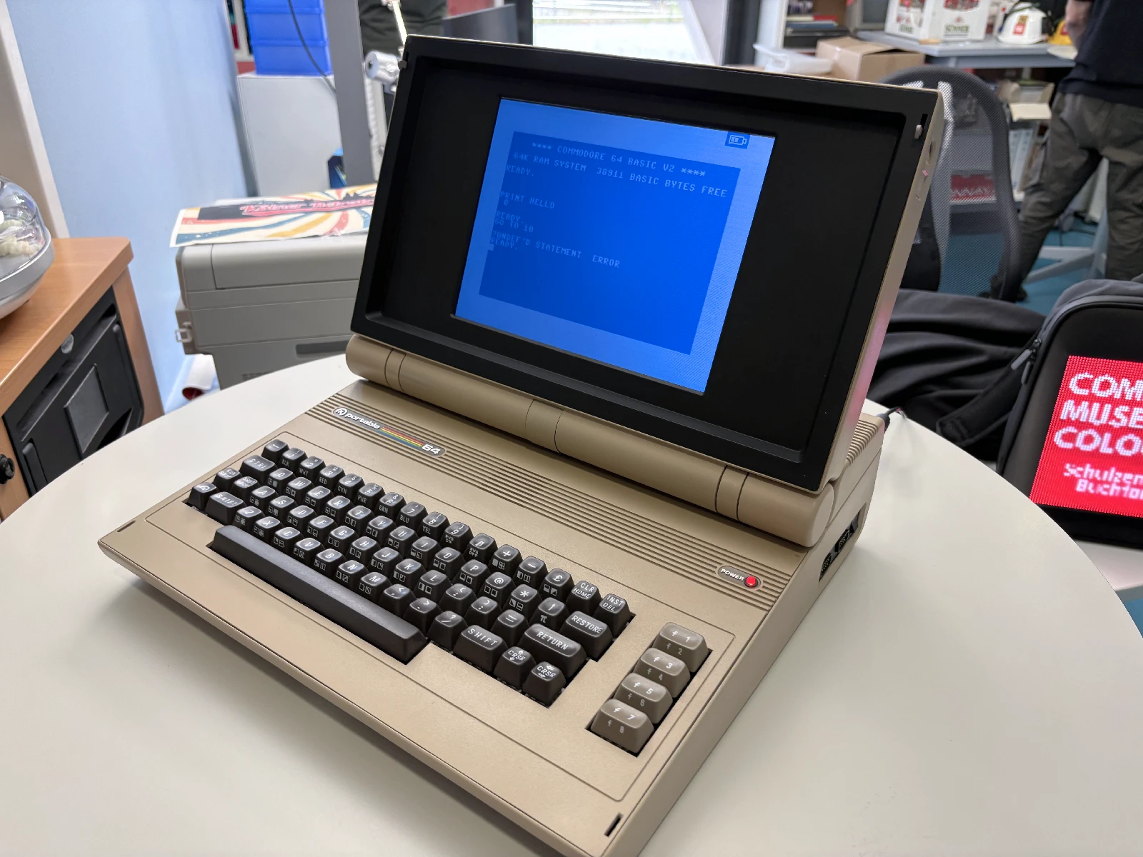 A Commodore 64 converted into a laptop with an LCD screen.