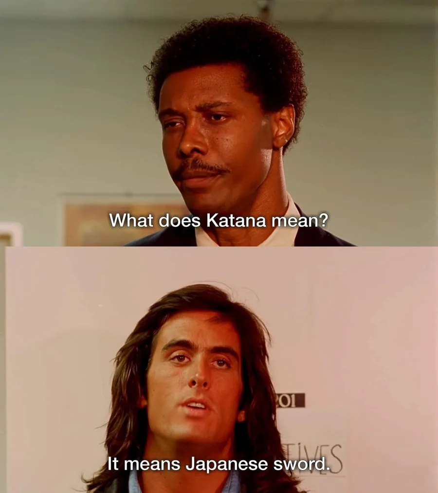A two-panel meme from the film Samurai Cop: in the top panel a man asks 'What does Katana mean?' and in the bottom panel another man answers 'It means Japanese sword.'