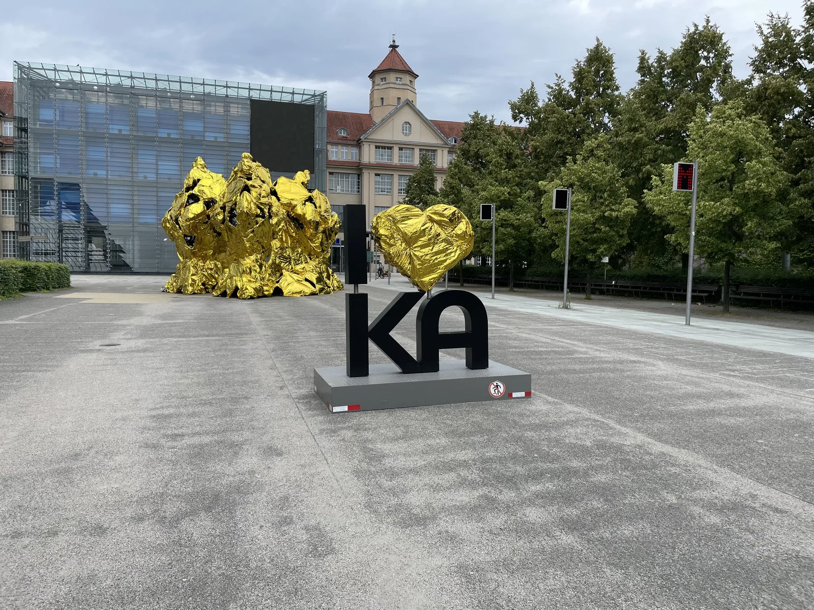 A large sculpture spelling 'I love KA' on the plaza outside the ZKM.