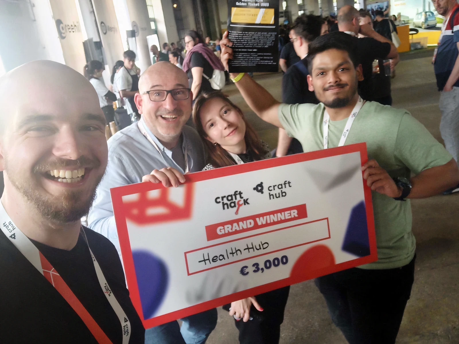 Our team at CraftHack 2023 in Budapest, celebrating our win with a voucher and a lot of smiles.