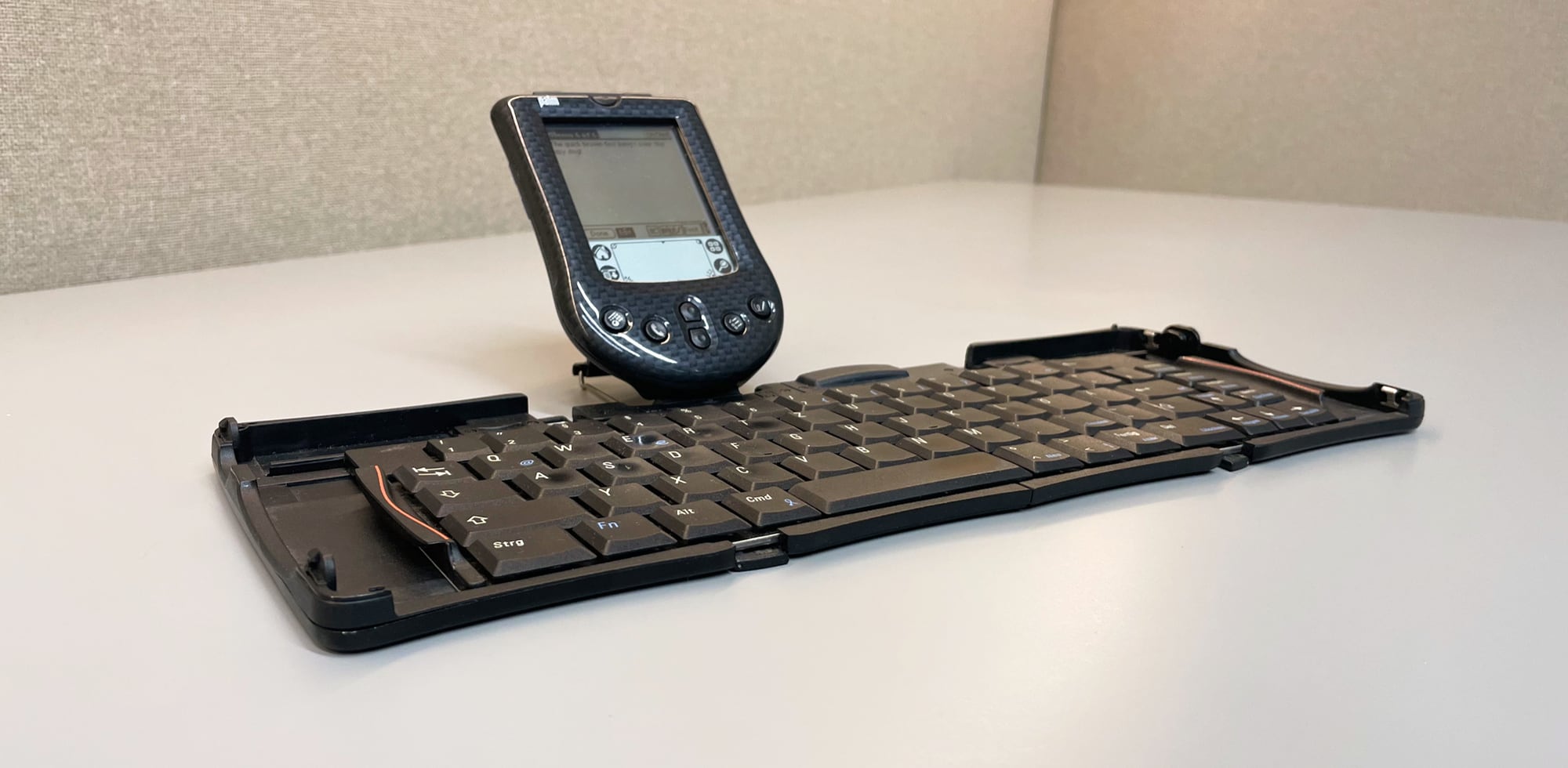 The Palm m125 with an open foldable keyboard