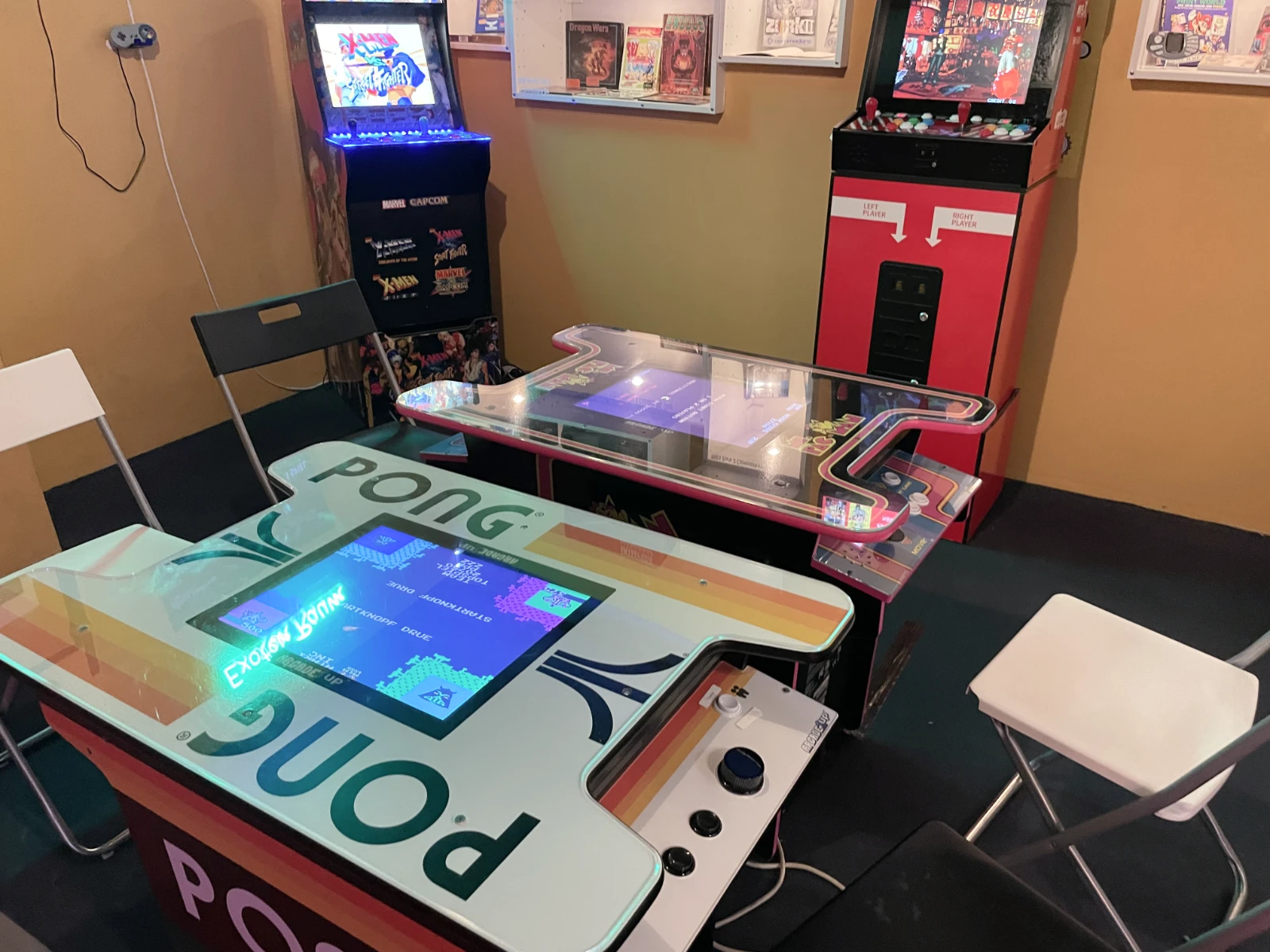 Row of arcade cabinets lined up in the museum.