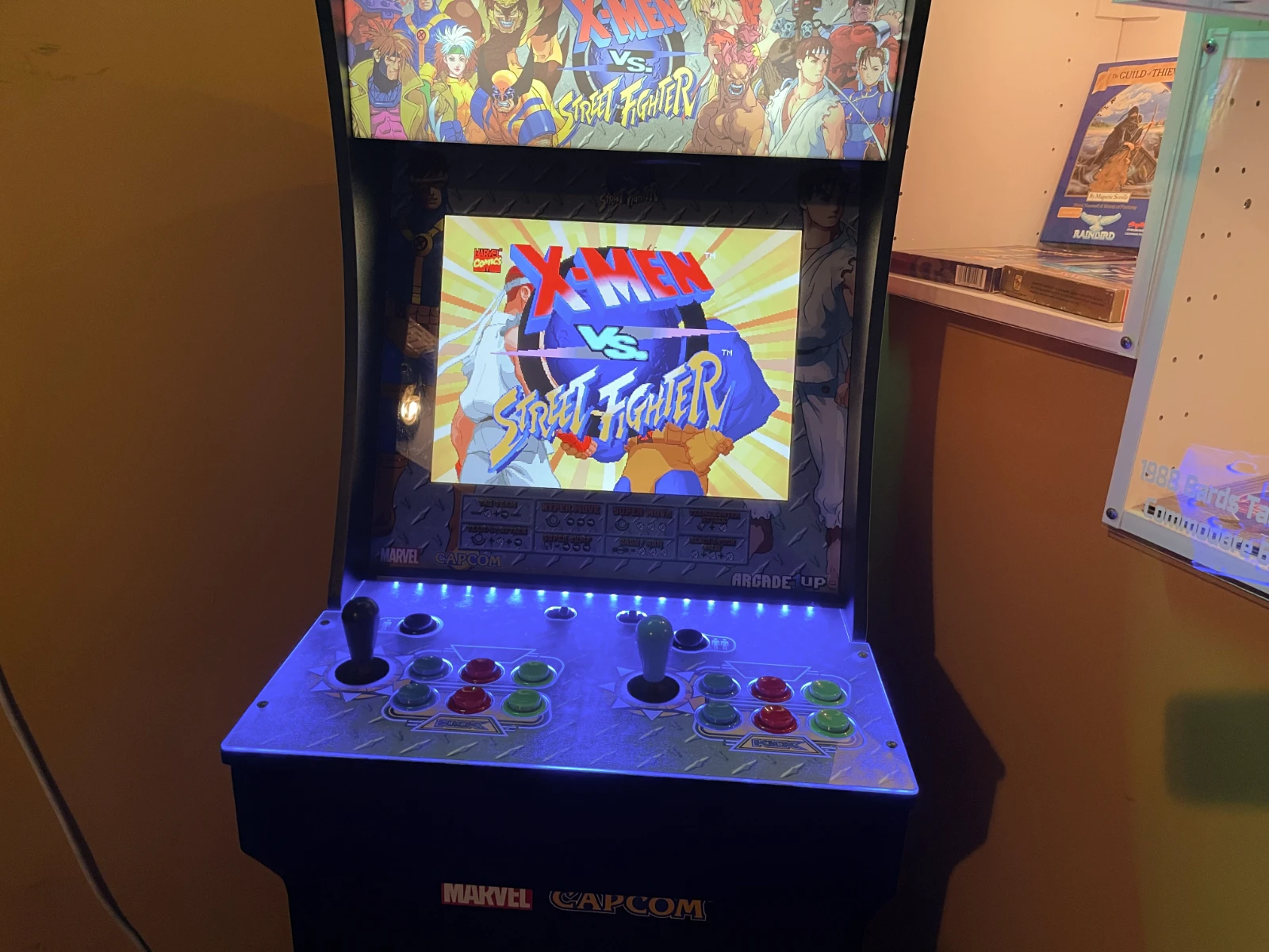 X-Men and Street Fighter arcade cabinets.