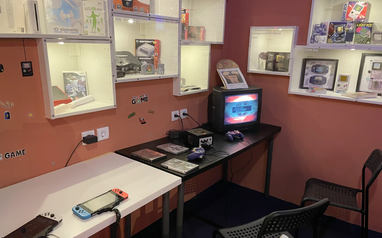 Nintendo GameCube and controllers on display.