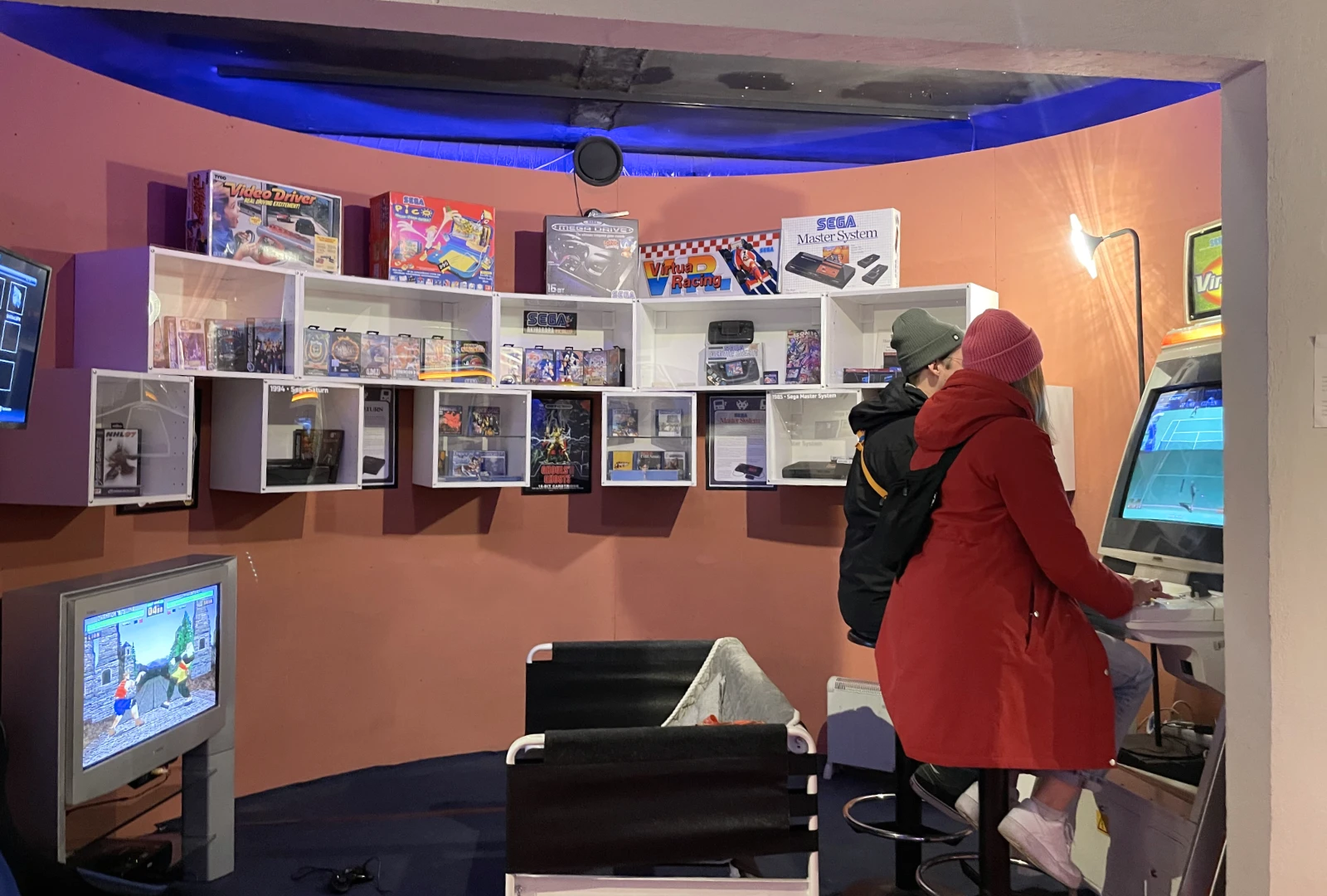 Visitors playing games at various stations.