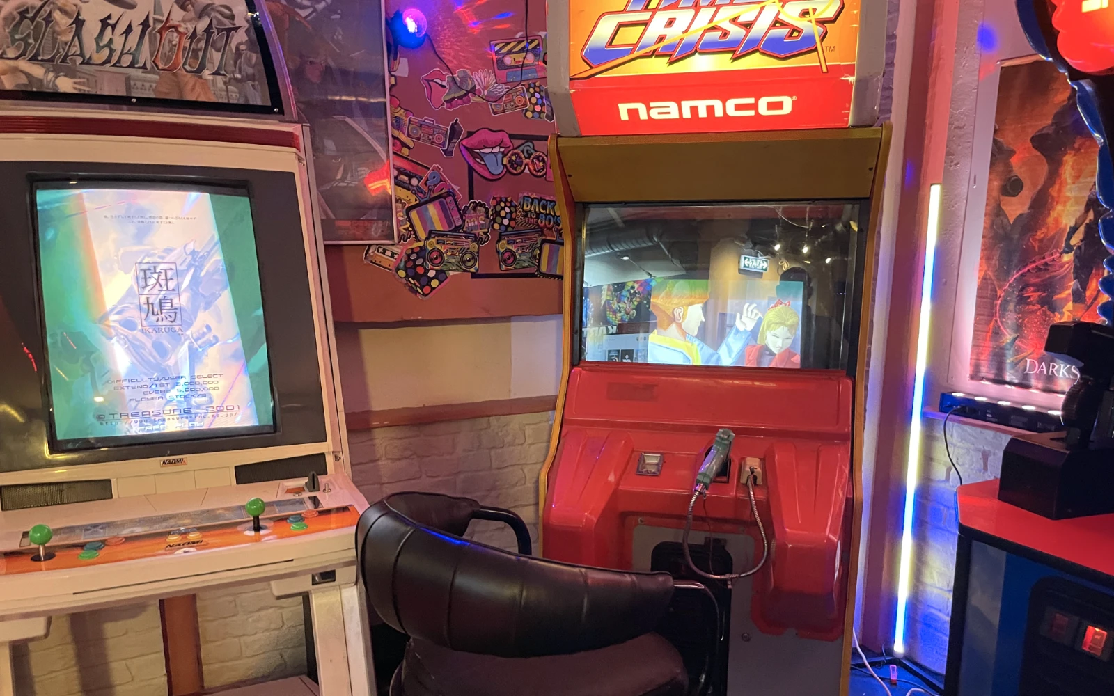 Collection of arcade machines in a row.