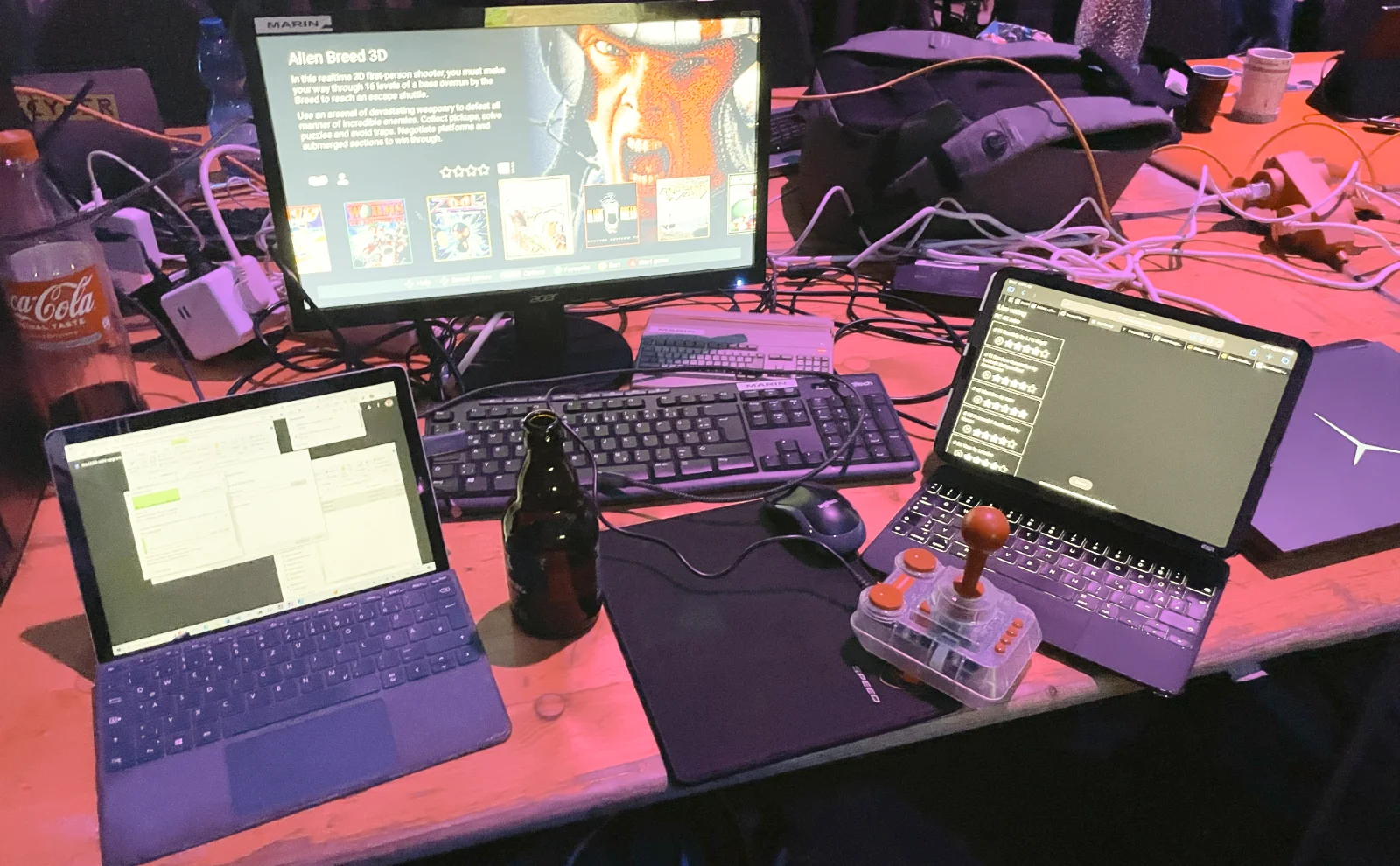 My setup consisting of a Surface Go 2, an external keyboard with TheA500mini and an external keyboard with a mouse, as well as my iPad Pro