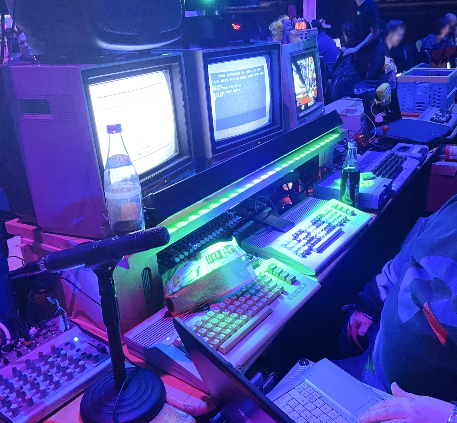 A C64 chiptunes setup with multiple devices and cables.